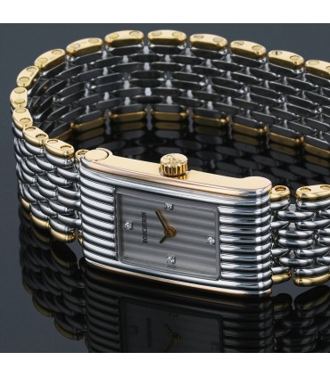 Boucheron Reflet stainless steel and gold watch