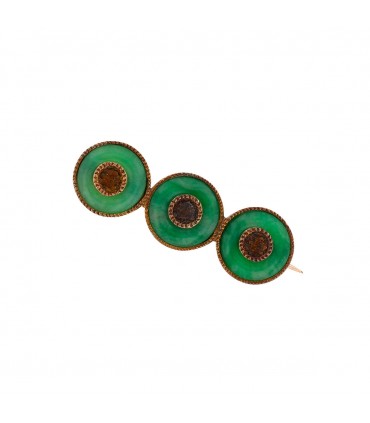 Jade and gold brooch