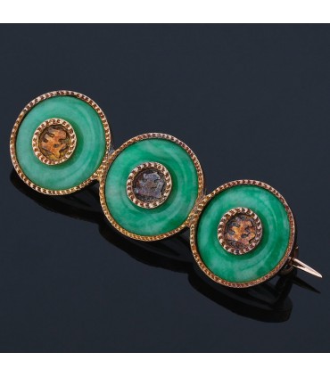 Jade and gold brooch