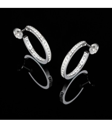 Cartier diamonds and gold earrings