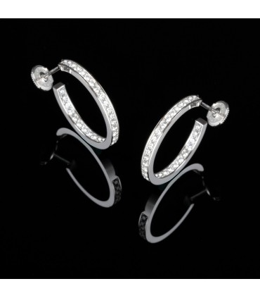 Cartier diamonds and gold earrings