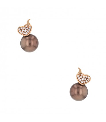 Cultured pearls, diamonds and gold earrings.