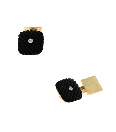 Gold and onyx cufflinks