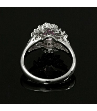 Pink sapphire, diamonds and platinum ring