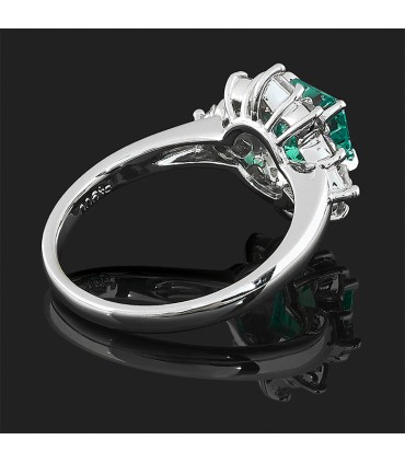 Emerald, diamonds and platinum ring