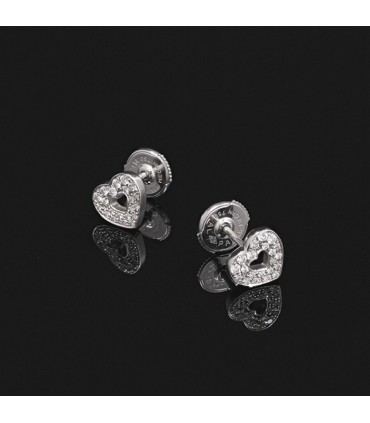 Poiray Coeur Secret diamonds and gold earrings