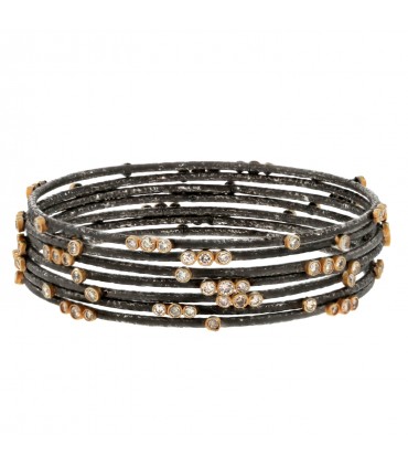 Diamonds, gold and steel bracelets