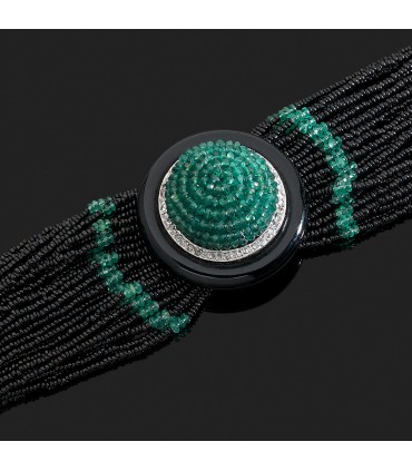 Bracelet or, onyx, émeraudes et diamants