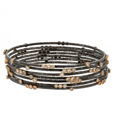 Diamonds, gold and steel bracelets