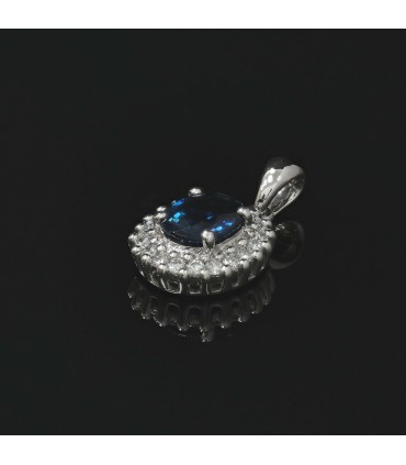 Pendentif or, diamants et saphir bleu