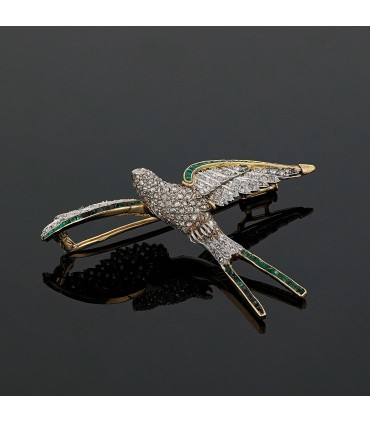 Broche oiseau or, platine, diamants et émeraudes