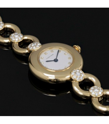 Cartier diamonds and gold watch