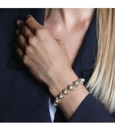 Cultured pearls and gold bracelet