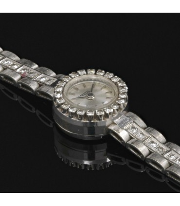 Diamonds and gold watch