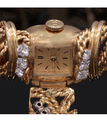 Diamonds, rubies and gold watch