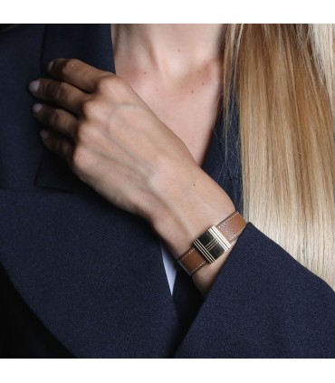 Hermès Glissade gold watch