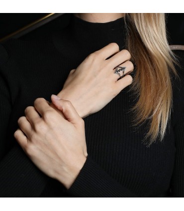 Djula black and white diamonds and gold ring