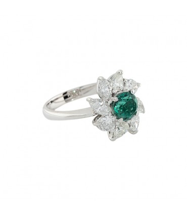 Emerald, diamonds and platinum ring