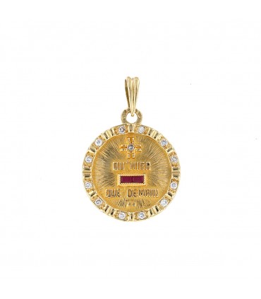 Diamonds, red stones and gold pendant