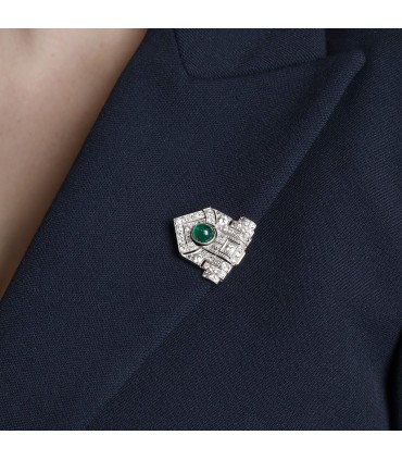 Emerald, diamonds and platinum brooch