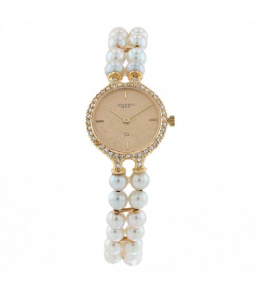 Diamonds, cultured pearl and gold watch