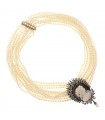 Diamonds, cultured pearl, caméo, gold and silver necklace