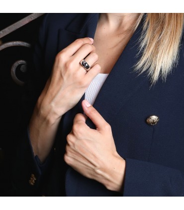 Grey spinel and gold ring