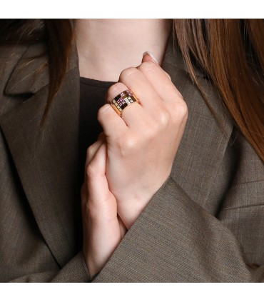 Cartier Lanière diamonds, pink sapphires and gold ring. Signed and numbered.