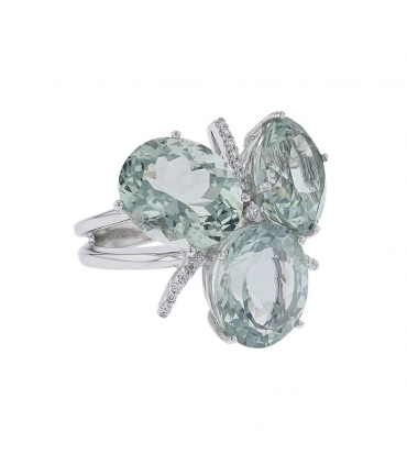 Diamonds, green natural stones and 18k gold ring