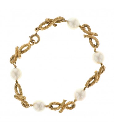 Cultured pearls and gold bracelet