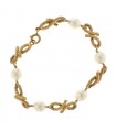 Cultured pearls and gold bracelet