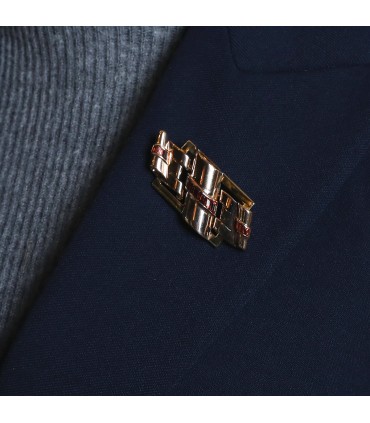 Gold and fine stones brooch