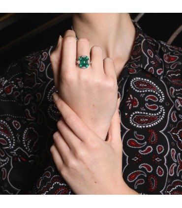 Emeralds, diamonds and gold ring