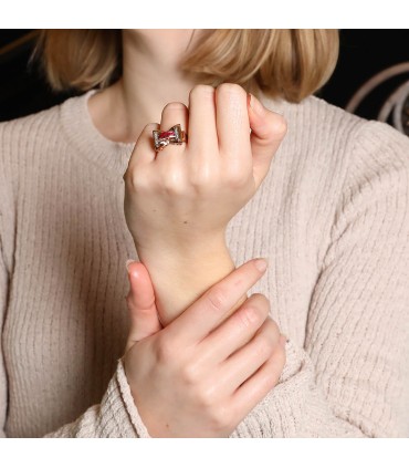 Diamonds, red stones and gold ring