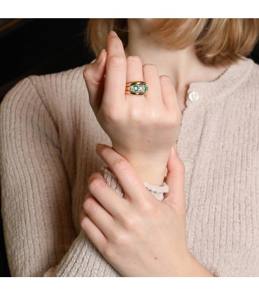 Emeralds, diamonds and gold ring