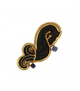 Viviane Debbas hard stone, sapphires and 18k gold brooch