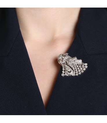Diamonds, platinum and 18k gold brooch.