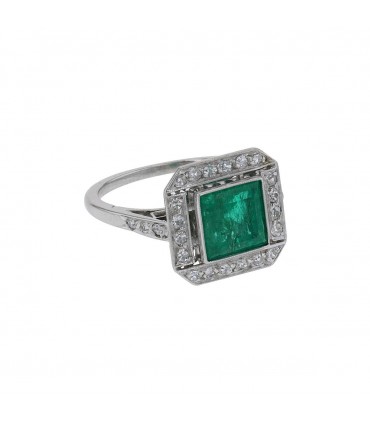 Emerald, diamonds and platinum ring