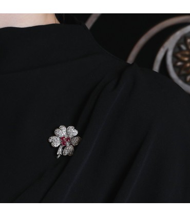 Diamonds, rubies and 18k gold brooch