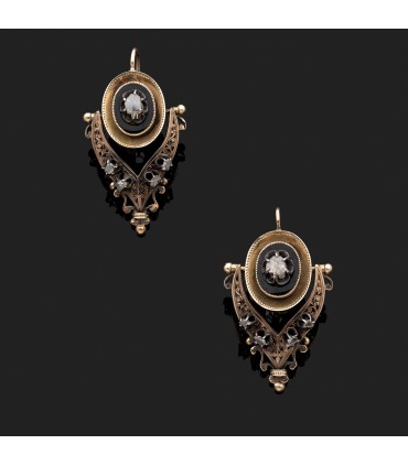 Diamonds, gold and silver earrings