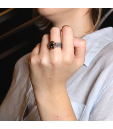 Stainless steel and gold ring