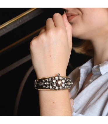 Bracelet or, diamants, ébène
