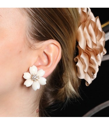 Van Cleef & Arpels Rose de Noël white coral, diamonds and gold earrings. Signed and numbered.