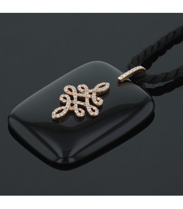 Collier or, onyx, diamants