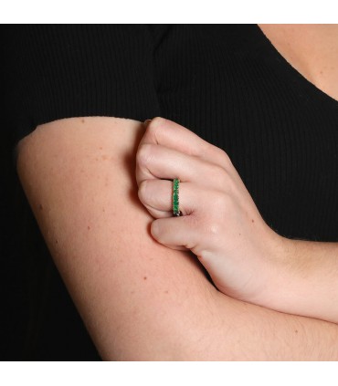 Emeralds and gold ring