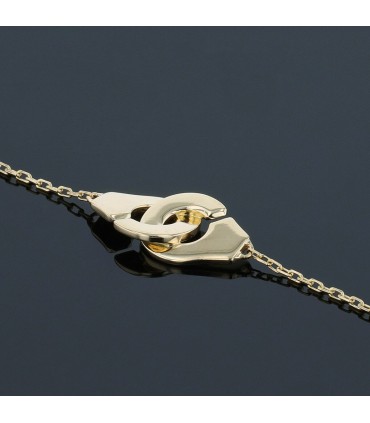 Dinh Van Menottes R8 gold bracelet