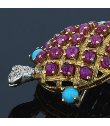 Turquoise, rubies, diamonds and gold brooch
