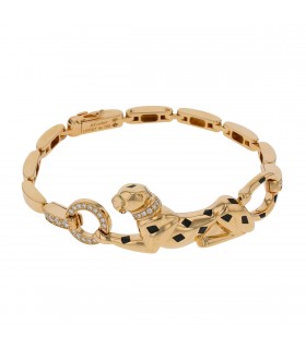 Cartier Panthère gold, diamonds, garnets, onyx and gold bracelet