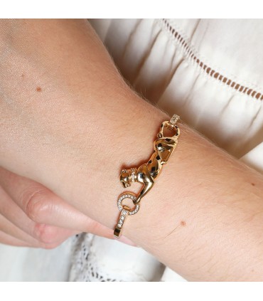 Cartier Panthère gold, diamonds, garnets, onyx and gold bracelet