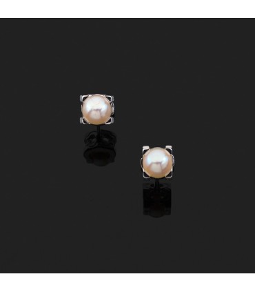 Boucles d’oreilles Cartier Double C